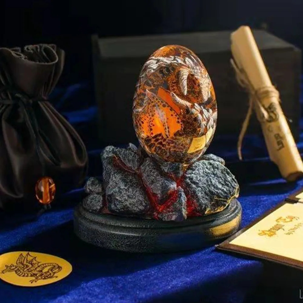 Estatua de huevo de dragón de  - Art Craft Easter reseña y precio